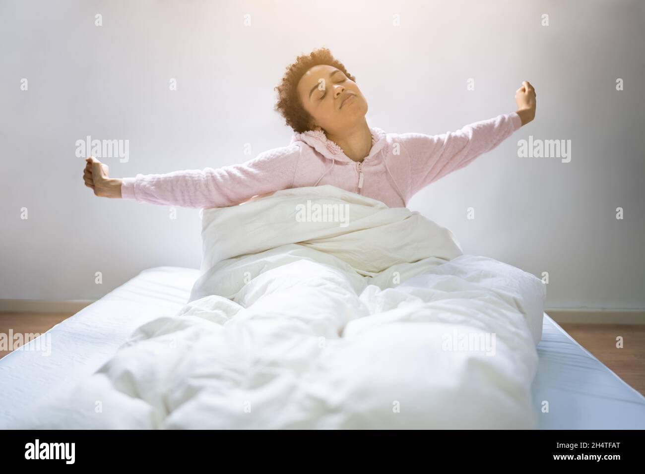 African Comfortable Woman Wake Up. Comfortable Sleep Stock Photo