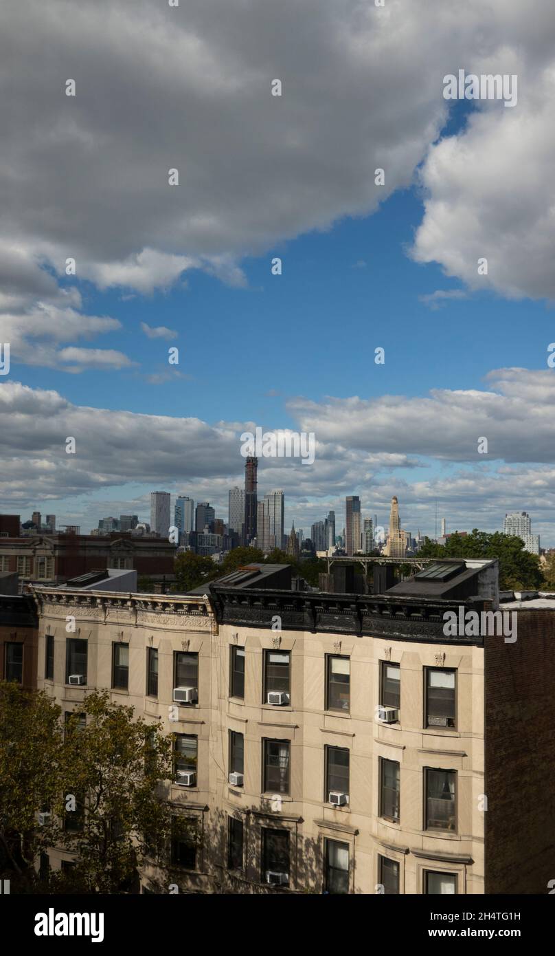 Manhattan skyline in the background with Park Slope apartment buildings