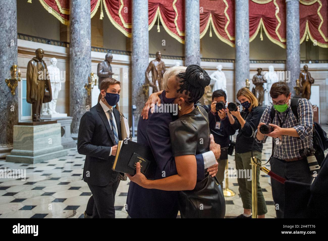 United States Representative Shontel Brown (Democrat of Ohio), right, is embraced by United States House Majority Leader Steny Hoyer (Democrat of Maryland), left, after being sworn-in as a member of the Congressional Black Caucus in Statuary Hall at the US Capitol in Washington, DC, Thursday, November 4, 2021. Credit: Rod Lamkey/CNP Stock Photo