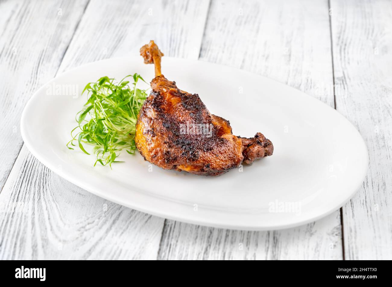 Duck Confit - a French dish made with the duck legs Stock Photo - Alamy