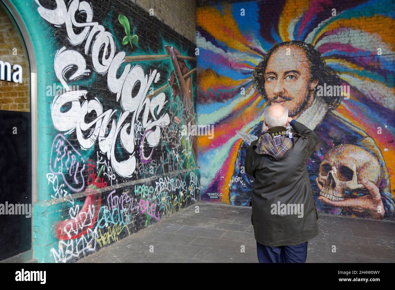 Graffiti Street Art Painting of William Shakespeare in Clink Street London by Jimmy C. Near to Rose and Globe theatres Stock Photo