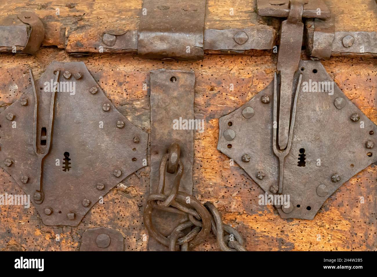 Very old lock on a wooden chest Stock Photo Alamy