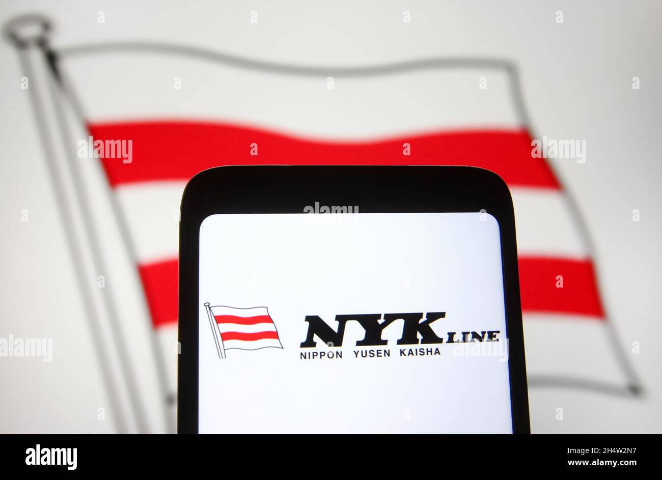 In this photo illustration a NYK Line (Nippon Yusen Kabushiki Kaisha) logo of a Japanese shipping company is seen on a smartphone screen. Stock Photo