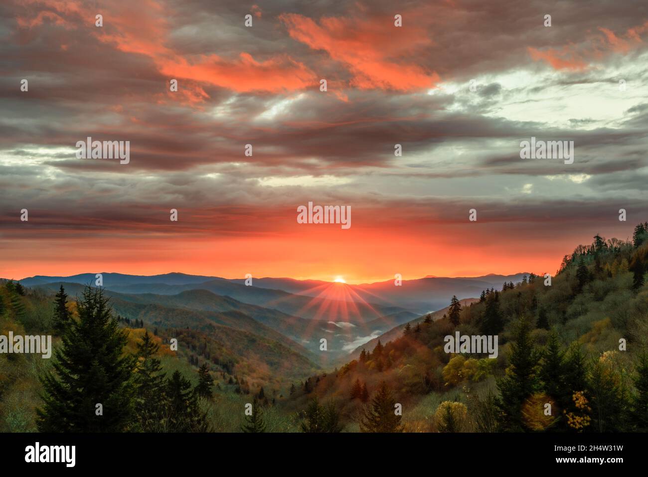 A dramatic autumn sunrise unfolds over the Oconaluftee Valley in Great Smoky Mountains National Park. Stock Photo