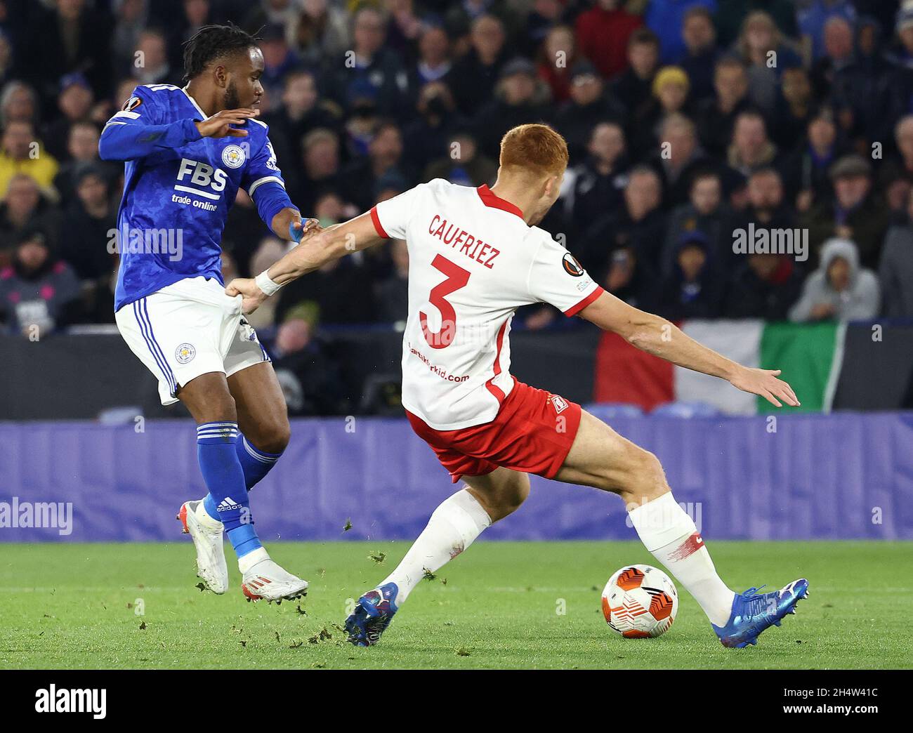 Leicester, England, 4th November 2021.  Maximiliano Caufriez of Spartak Moscow pulls the shorts of Ademola Lookman of Leicester City during the UEFA Europa League match at the King Power Stadium, Leicester. Picture credit should read: Darren Staples / Sportimage Stock Photo