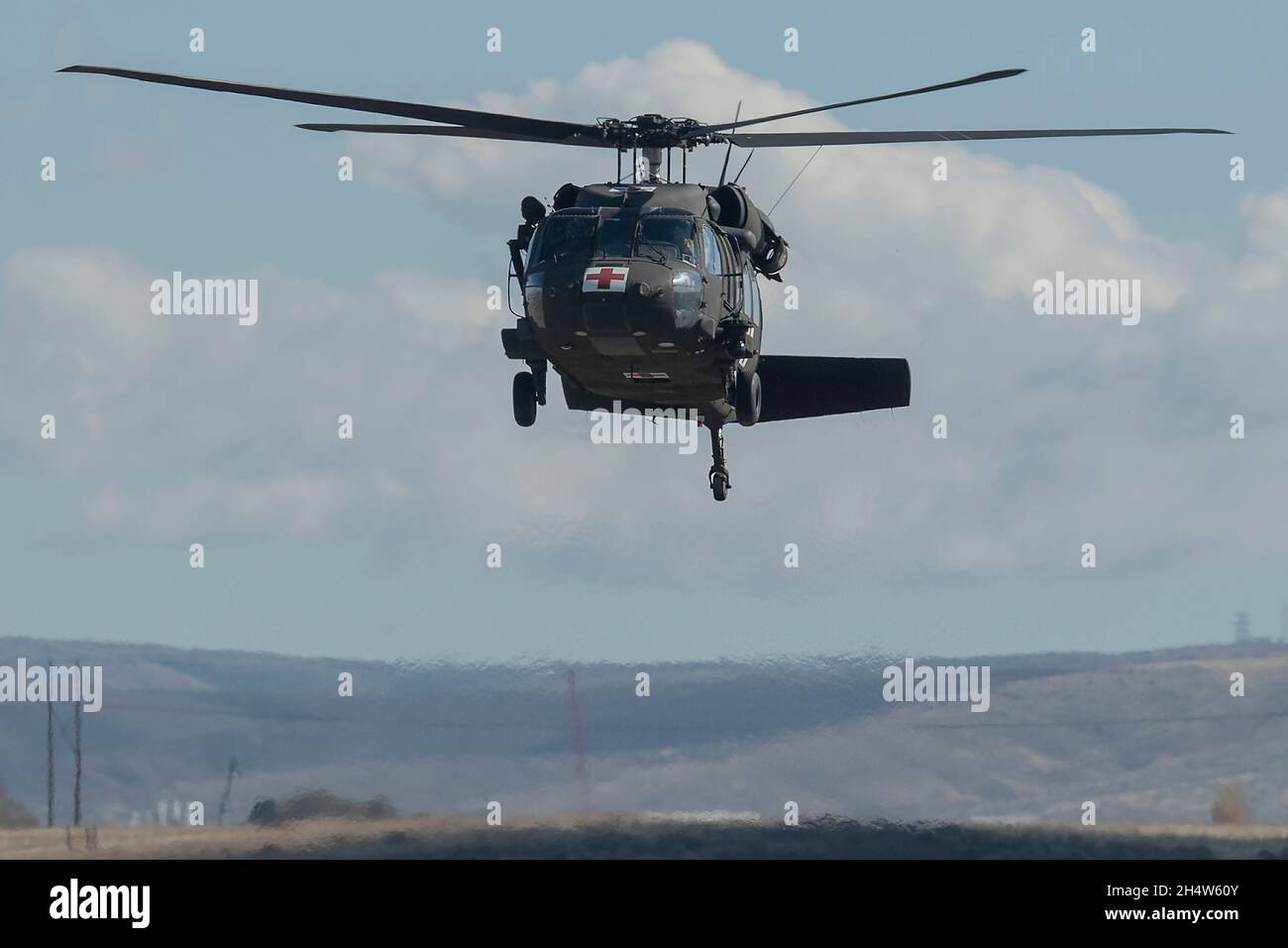 Idaho Army National Guard Helicopters And Air Crews Teamed Up With City Of Boise Fire Department Firefighters Conducting Simulated Swift Water Rescue Training On Gowen Field An Idaho Army National Guard Uh 60