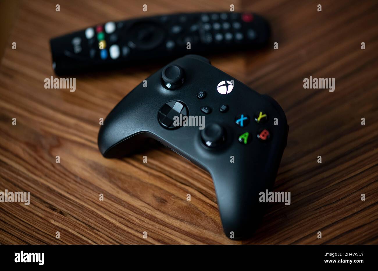 Berlin, Germany. 04th Nov, 2021. A controller of the Xbox Series X game  console is on the table. Playstation 5 and Xbox Series X have been on the  market for a year,