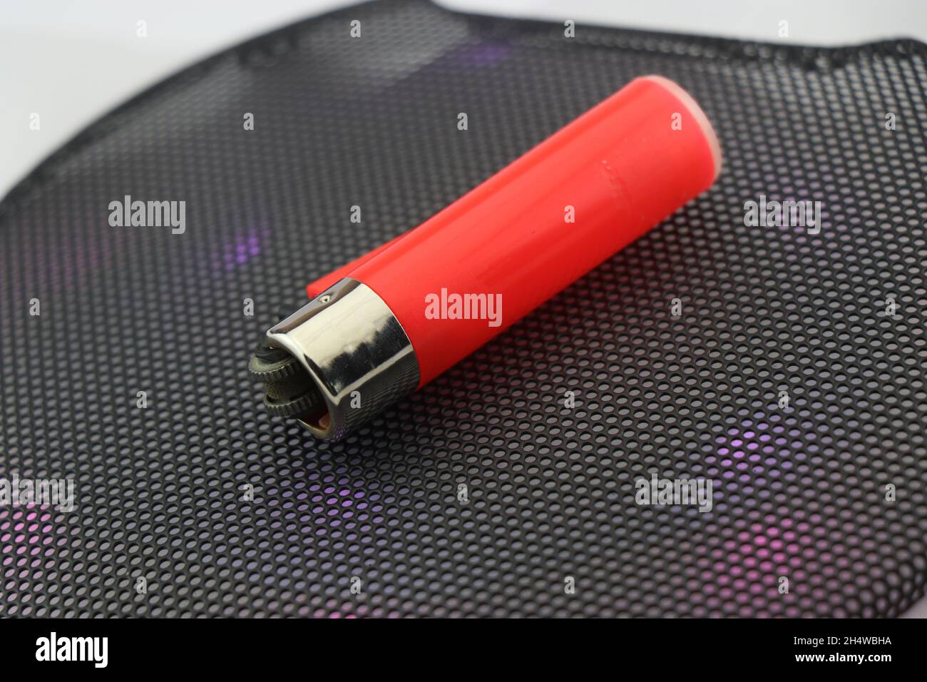 Kitchen lighter or cigarette lighter used to start fire laid flat Stock