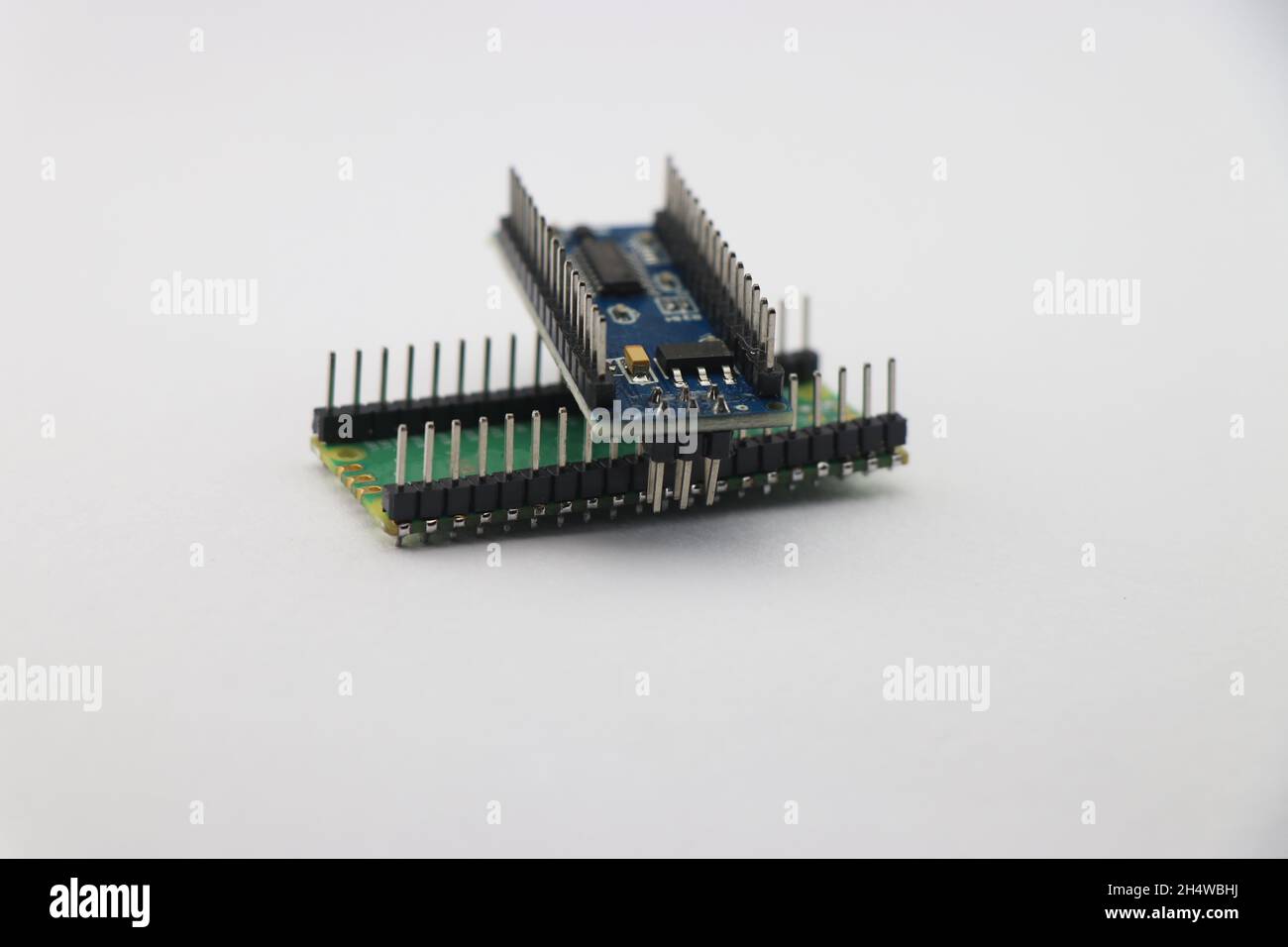 Microcontroller boards used to make IoT projects and robotic prototyping projects, Arduino and RPI boards with details of the connection pin Stock Photo