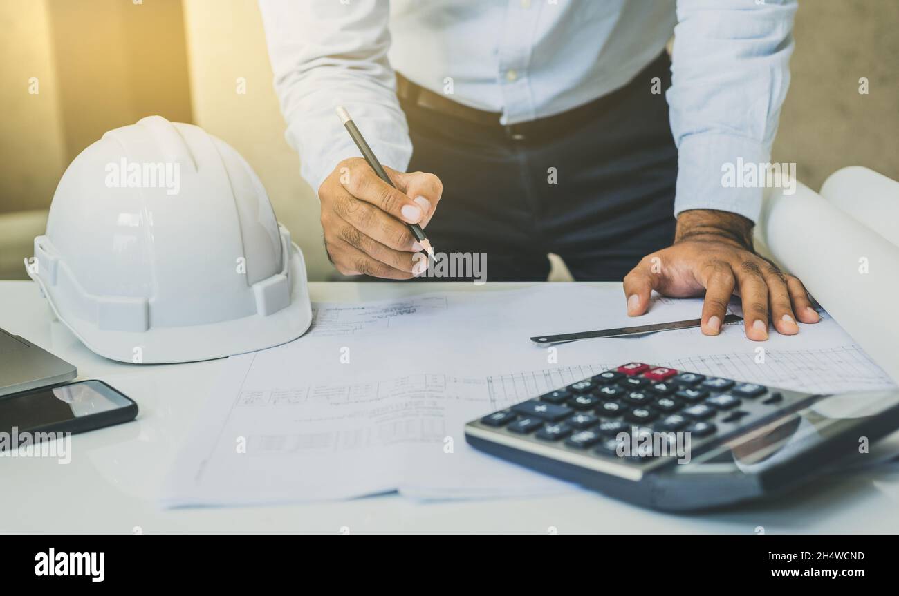Engineer or architects working planning project on desk. Stock Photo