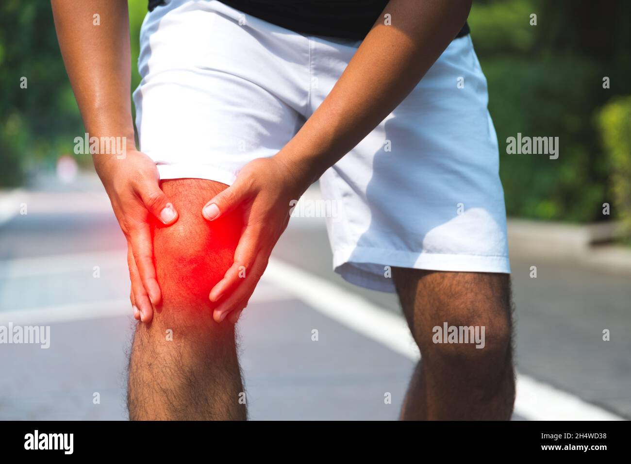 Man having knee pain. Stock Photo
