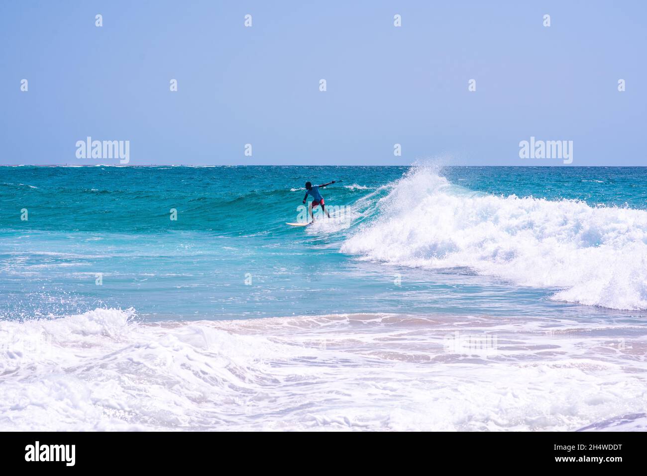 Black man surfing wave hi-res stock photography and images - Alamy