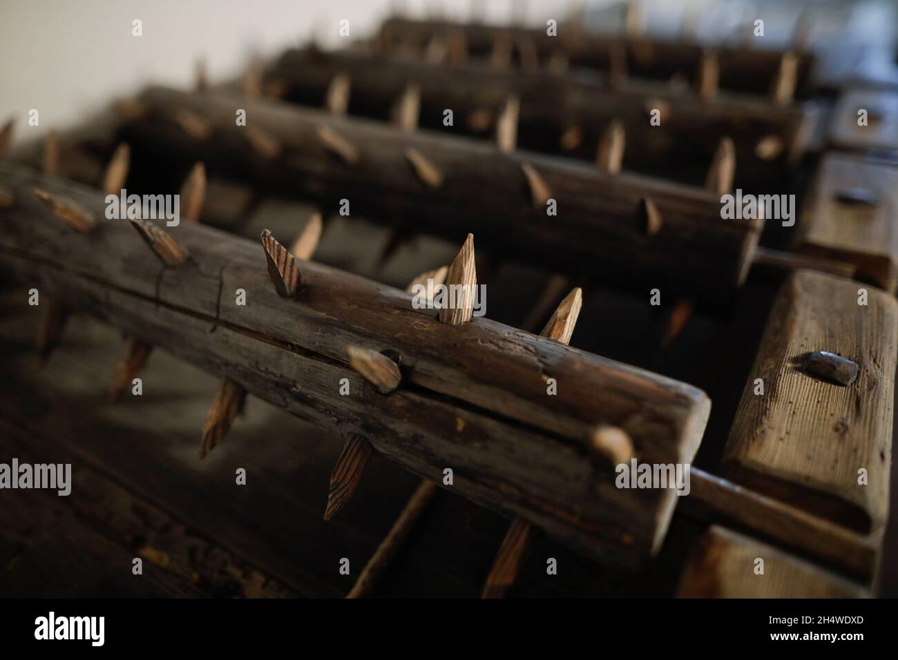 Details with medieval torture devices from the middle ages inside the Bran Castle, known also as Dracula’s Castle in Transylvania, Romania. Stock Photo