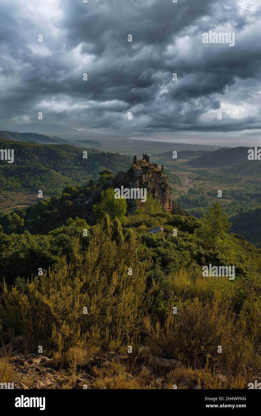 Miravet castle in cabanes under cloudy sky, Spain Stock Photo