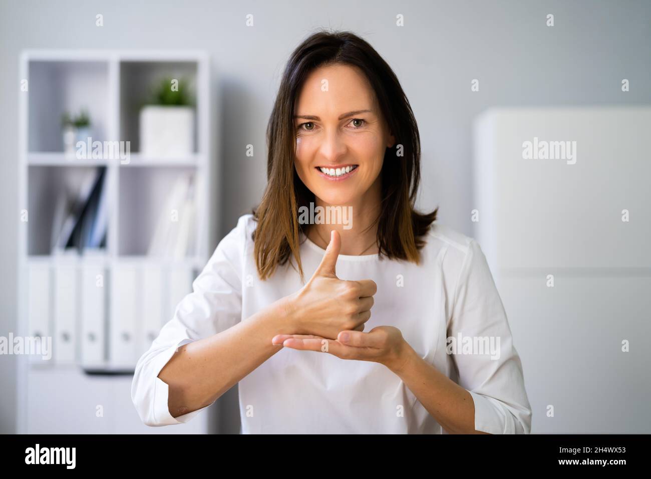 Learning Disability Sign Language For Deaf People Stock Photo