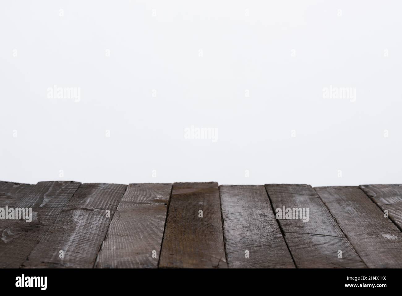 Wooden table from old planks, empty for your product, with neutral gray background Stock Photo