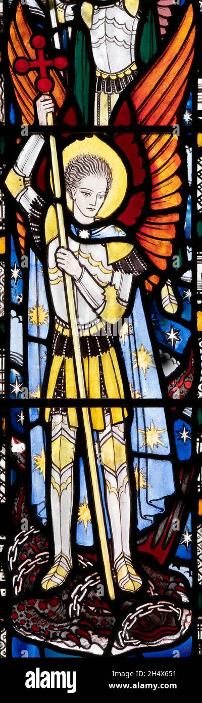 St Michael overcoming 'Satan' as depicted by J. E. Nuttgens (1948), Doddington Church, Northumberland, UK Stock Photo