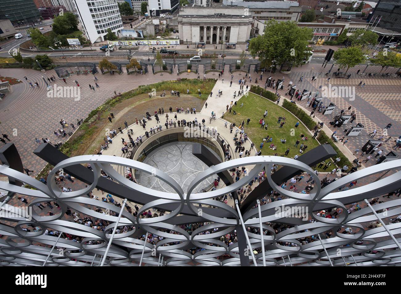 The public gathering outside the new Library of Birmingham on its opening day, Centenery Square on 3rd September 2013 - Birmingham Stock Photo