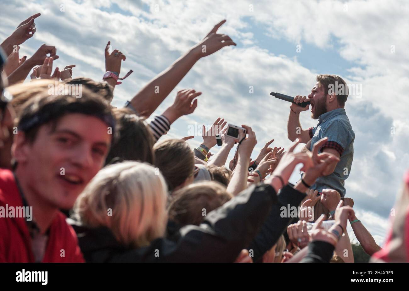 Rou Reynolds of Enter Shikari going in the pit during their performance on day 2 at Leeds Festival on 23rd August 2014 at Bramham Park, Leeds Stock Photo