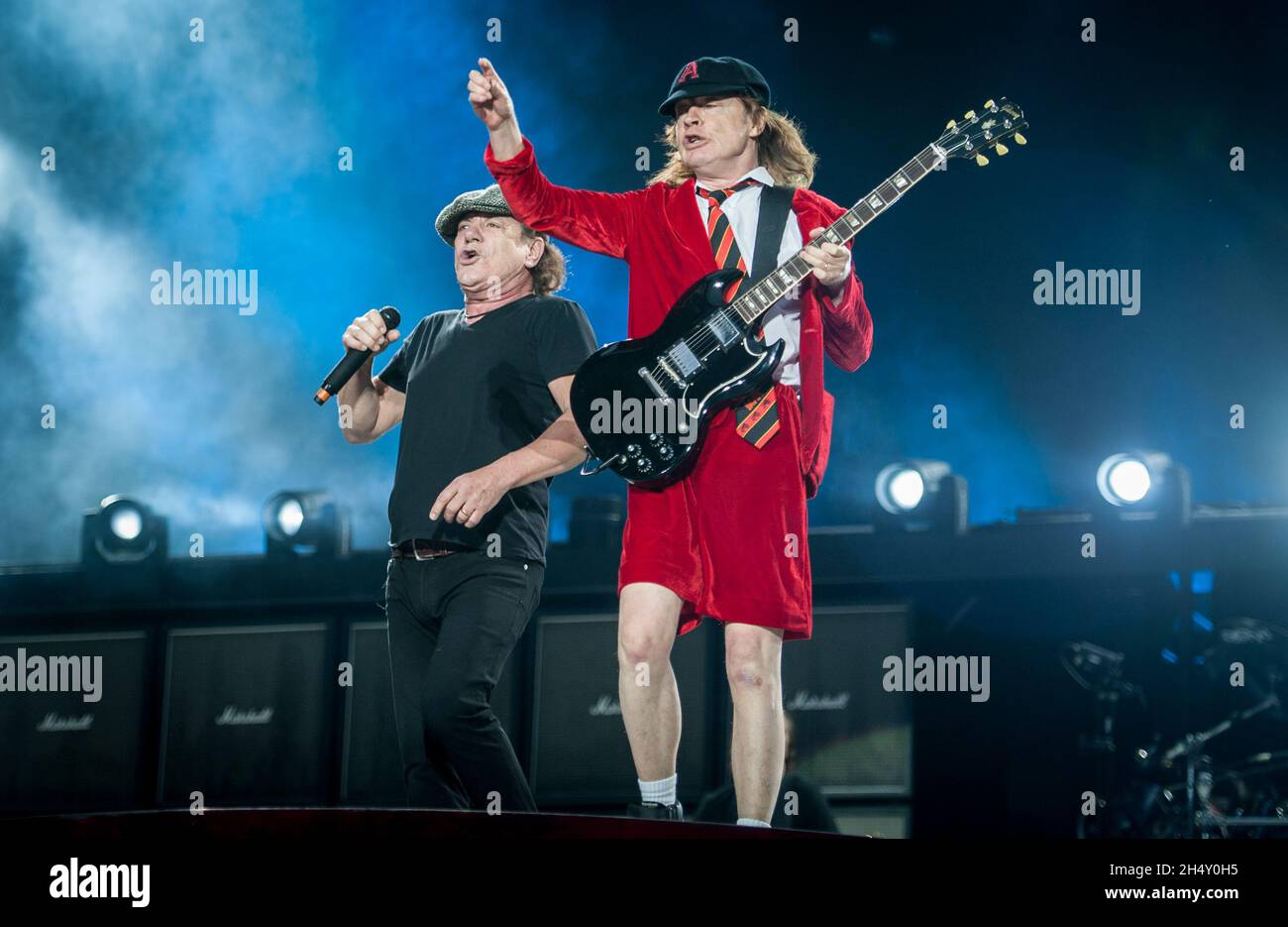 Angus Young and Brian Johnson of AC/DC performing live on stage at ...