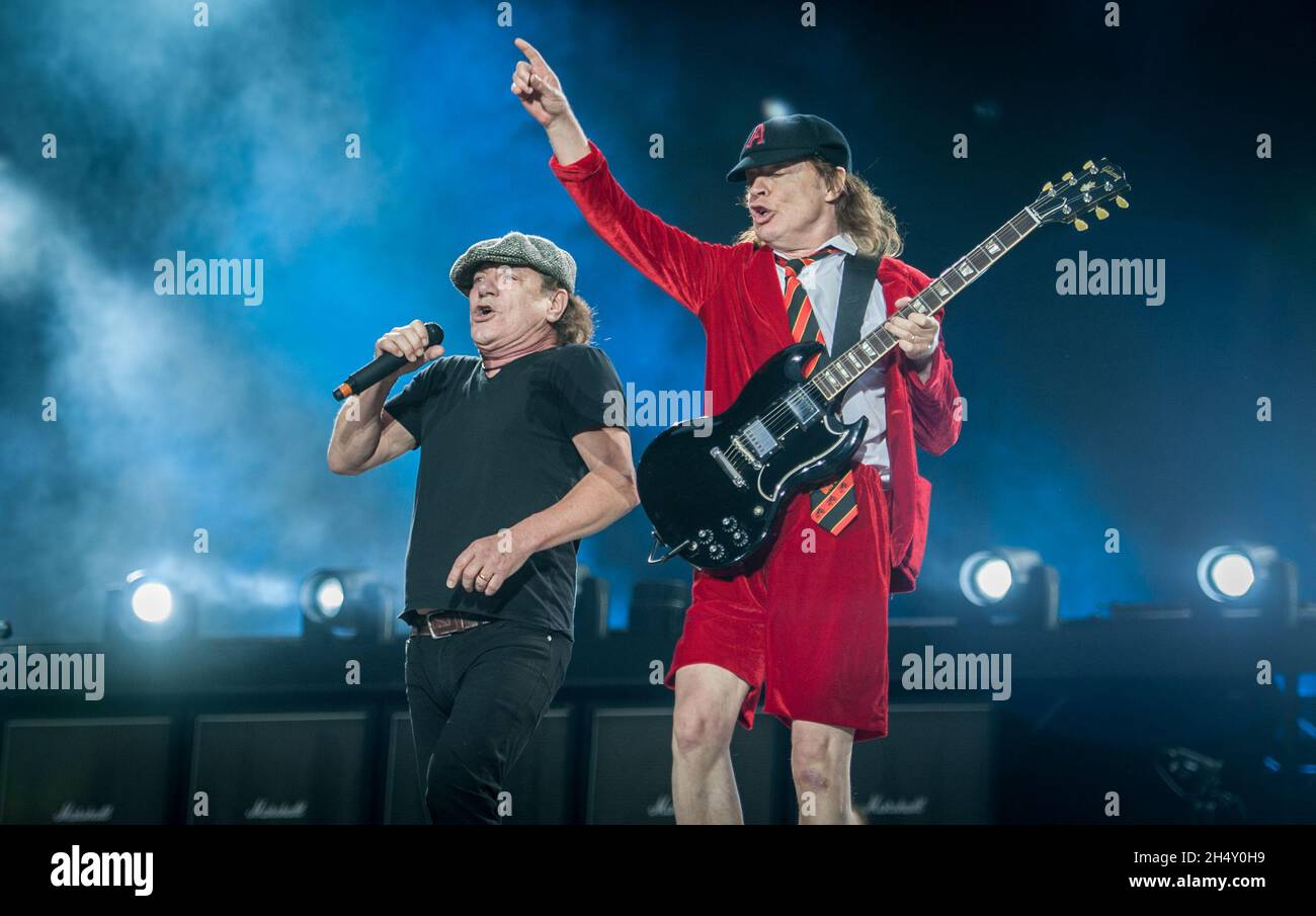 Angus Young and Brian Johnson of AC/DC performing live on stage at ...