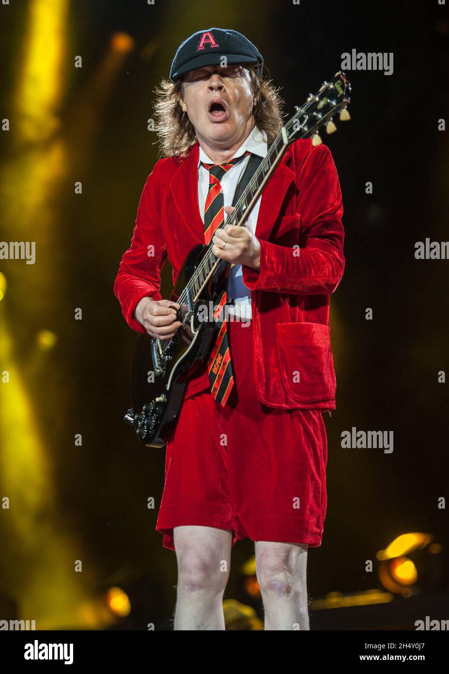Angus Young of AC/DC performing live on stage at Wembley Stadium on July 04, 2015 in London, United Kingdom Stock Photo
