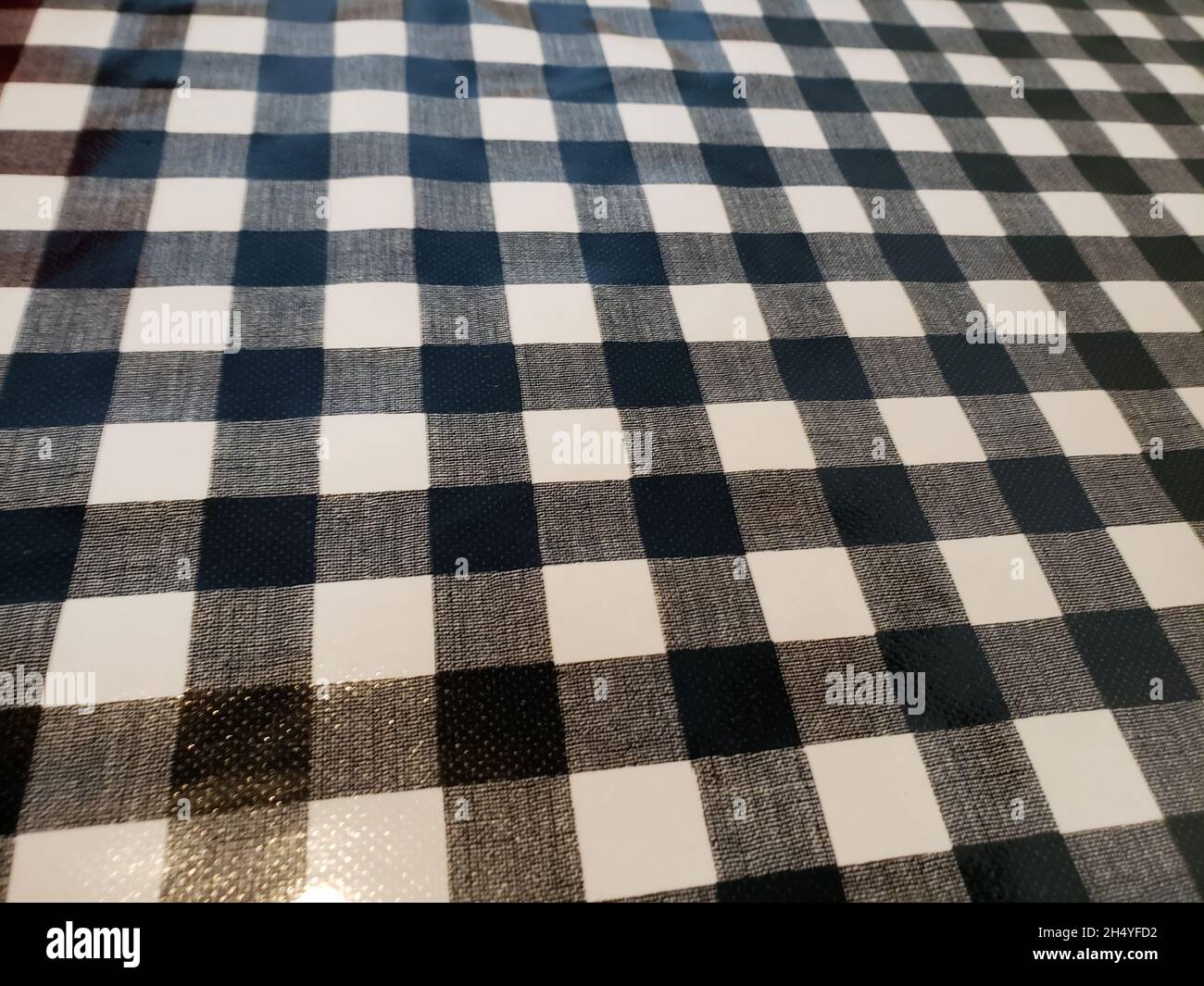 Polyester Black and White Checkerboard Tablecloth Pattern Stock Photo