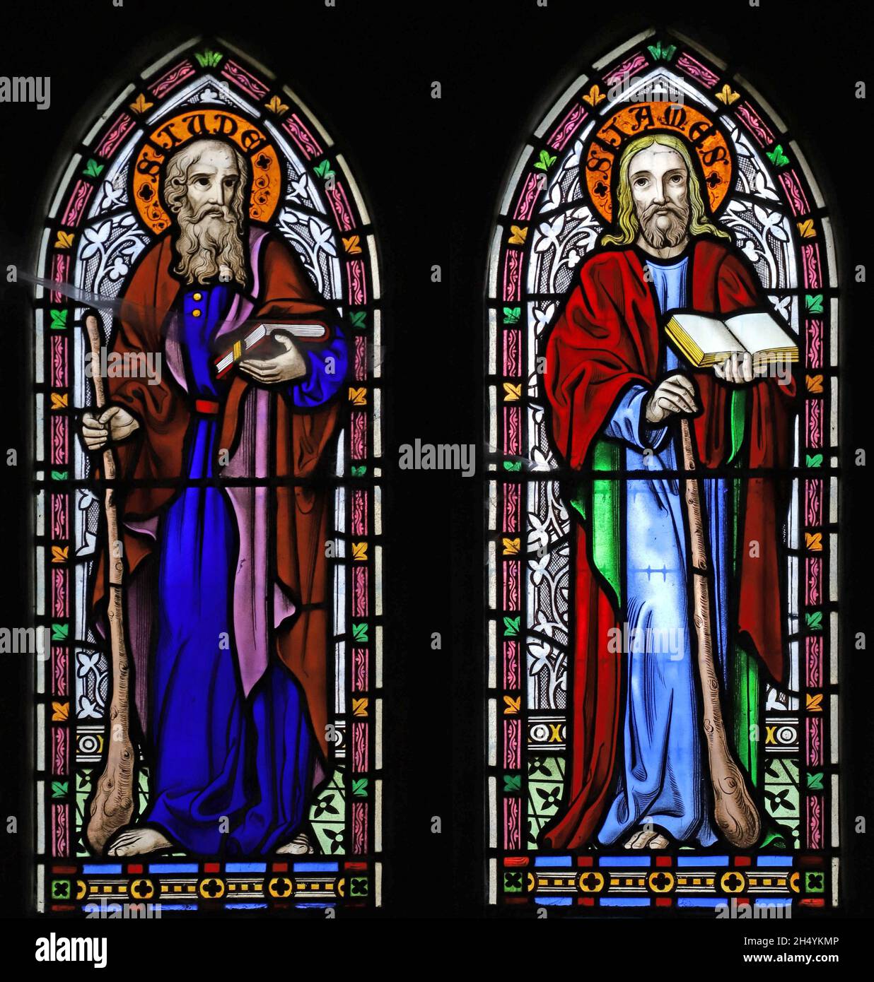 A stained glass window by Michael O'Connor depicting disiples St Jude & St James, St Michael & All Angels Church, Fringford, Oxfordshire Stock Photo