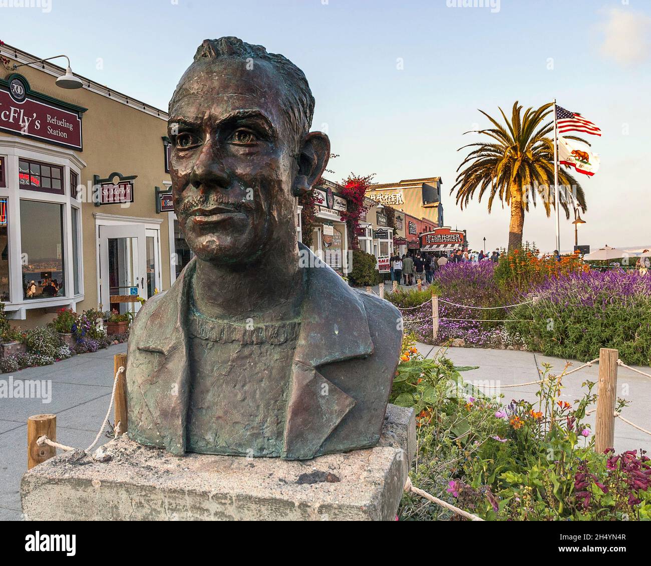 Monterey, CA, USA - August 7, 2009: Bronze bust of American author John Steinbeck, located in the historic district of Monterey called Cannery Row. Stock Photo