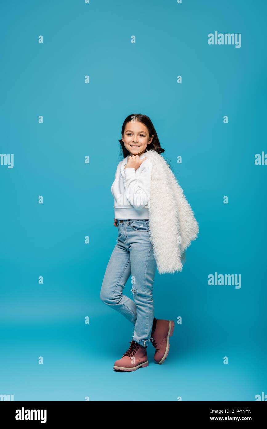 Preteen girl in blue jeans hi-res stock photography and images - Alamy