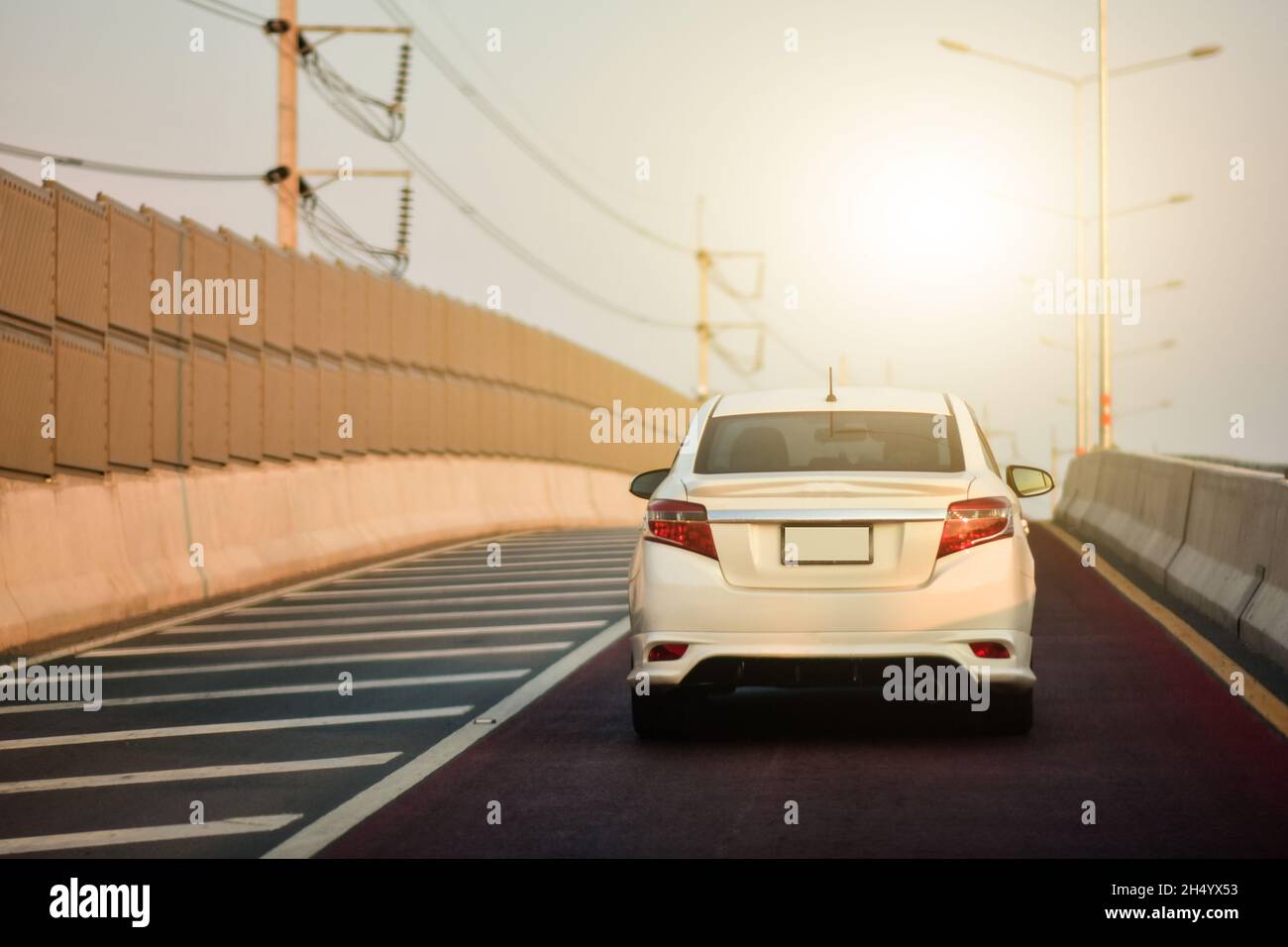 Car driving on road city hi-res stock photography and images - Alamy
