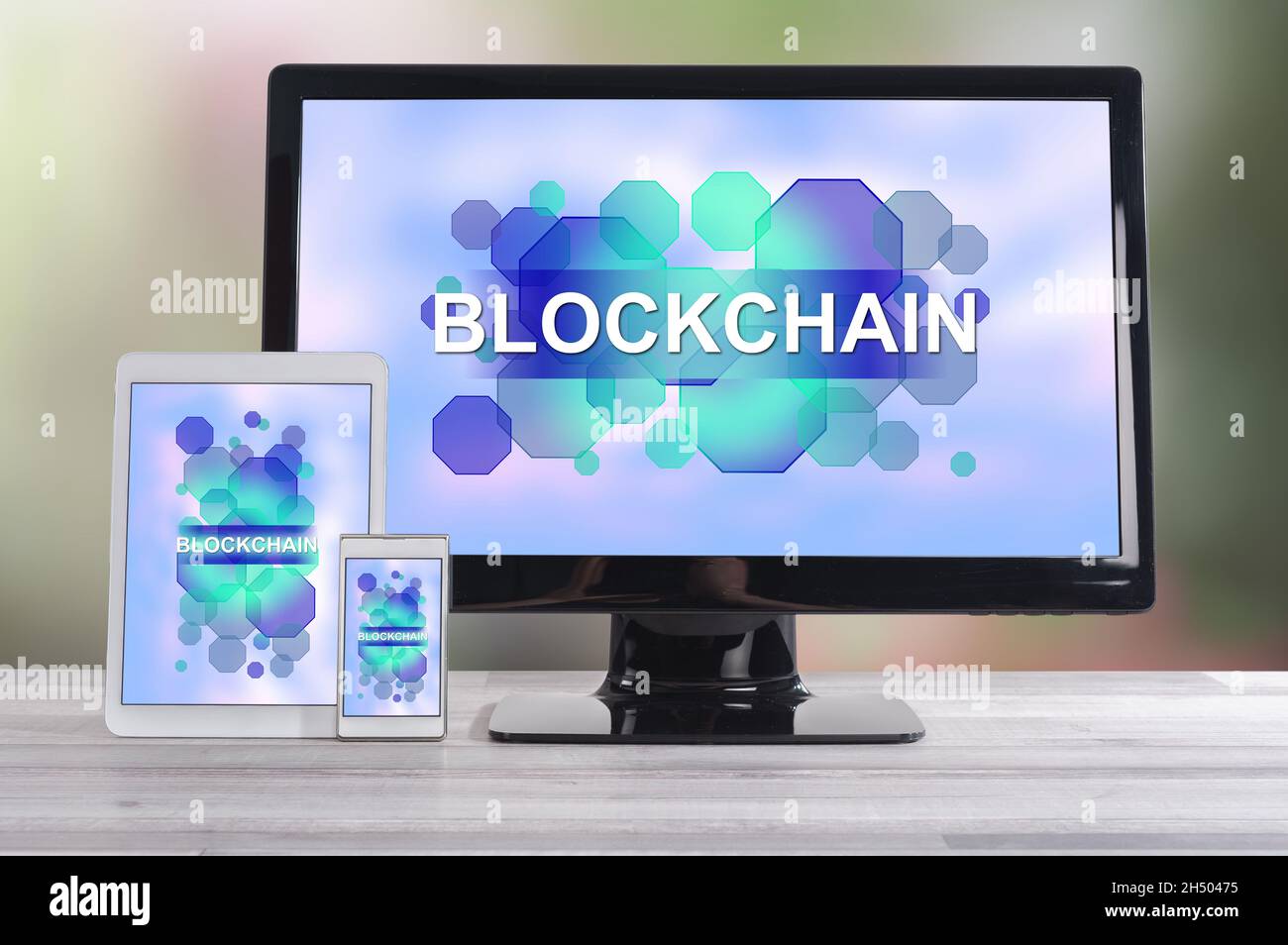 Blockchain concept shown on different information technology devices Stock Photo