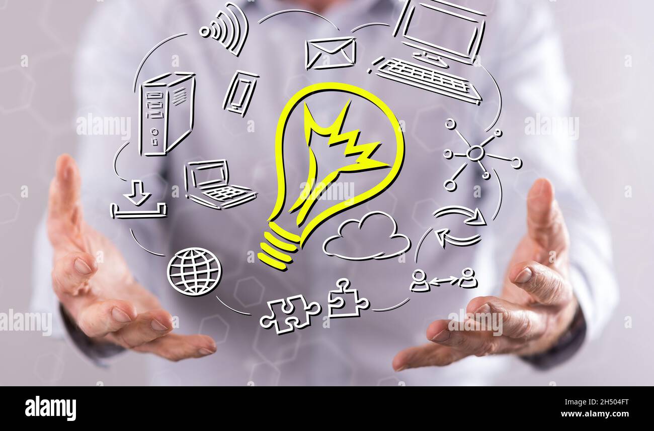 Innovative idea concept above the hands of a man in background Stock ...