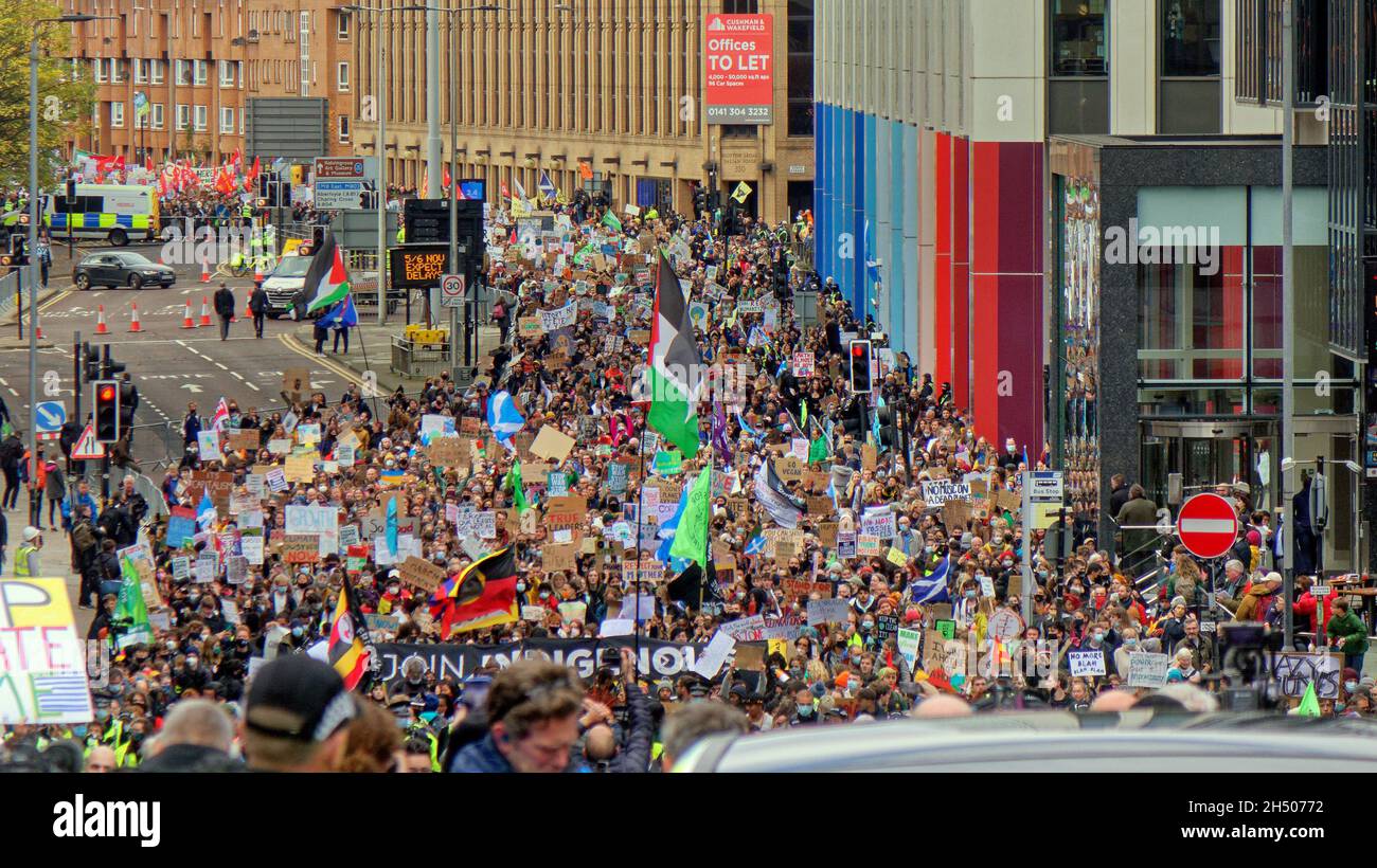 Glasgow, Scotland, UK  5th November, 2021. Climate change Friday march brought the city to a standstill with deliveries cancelled or delayed city wide as the route was packed with protesters and totally controlled by police.  Credit  Gerard Ferry/Alamy Live News Stock Photo