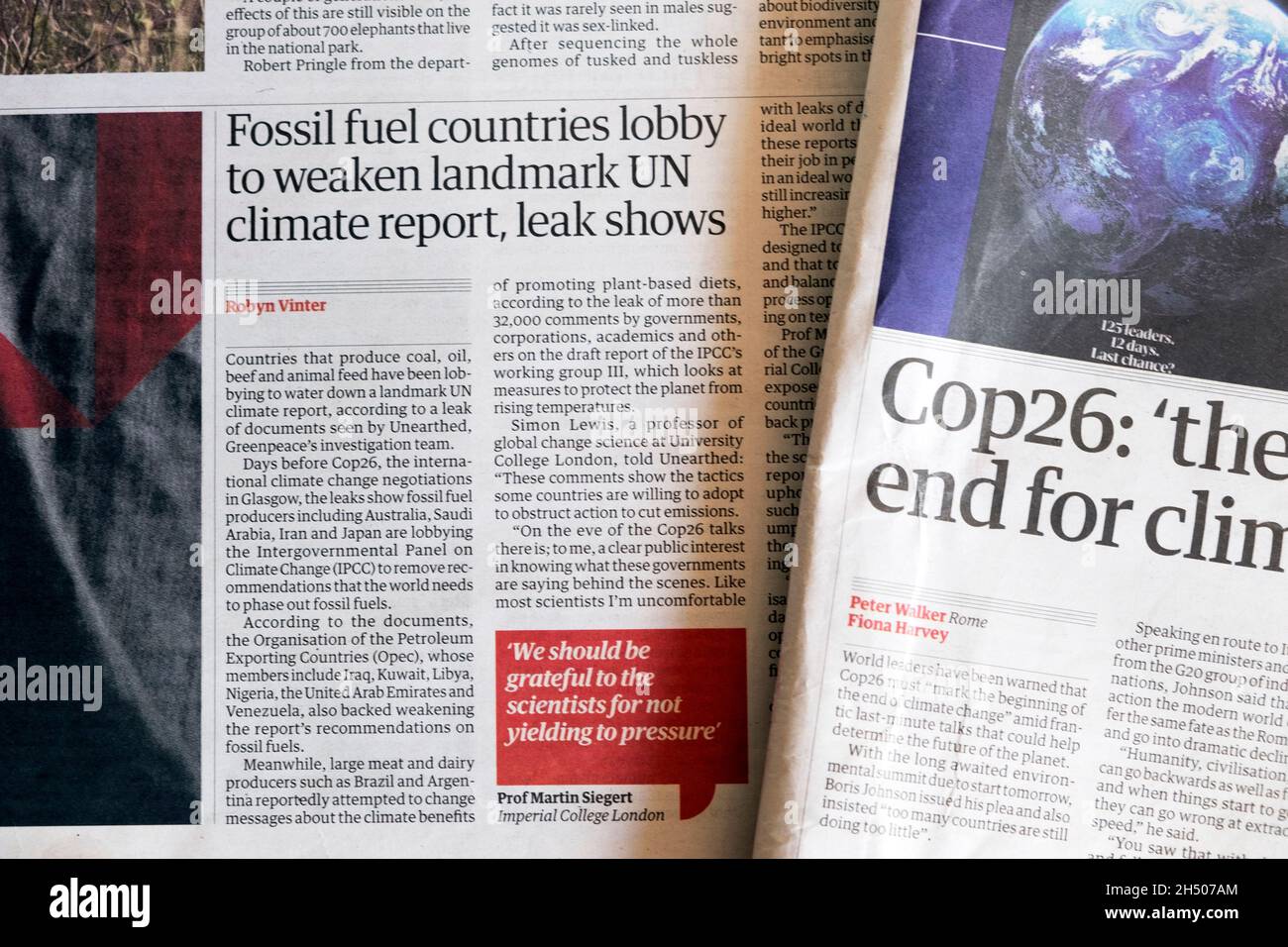 'Fossil fuel countries lobby to weaken landmark UN climate report, leak shows' & Cop26 climate crisis newspaper headlines Guardian newspaper London UK Stock Photo