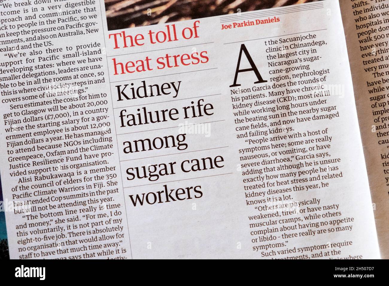 'Kidney failure rife among sugar cane workers' newspaper headline article in Guardian on 2 October 2021 in London UK Stock Photo