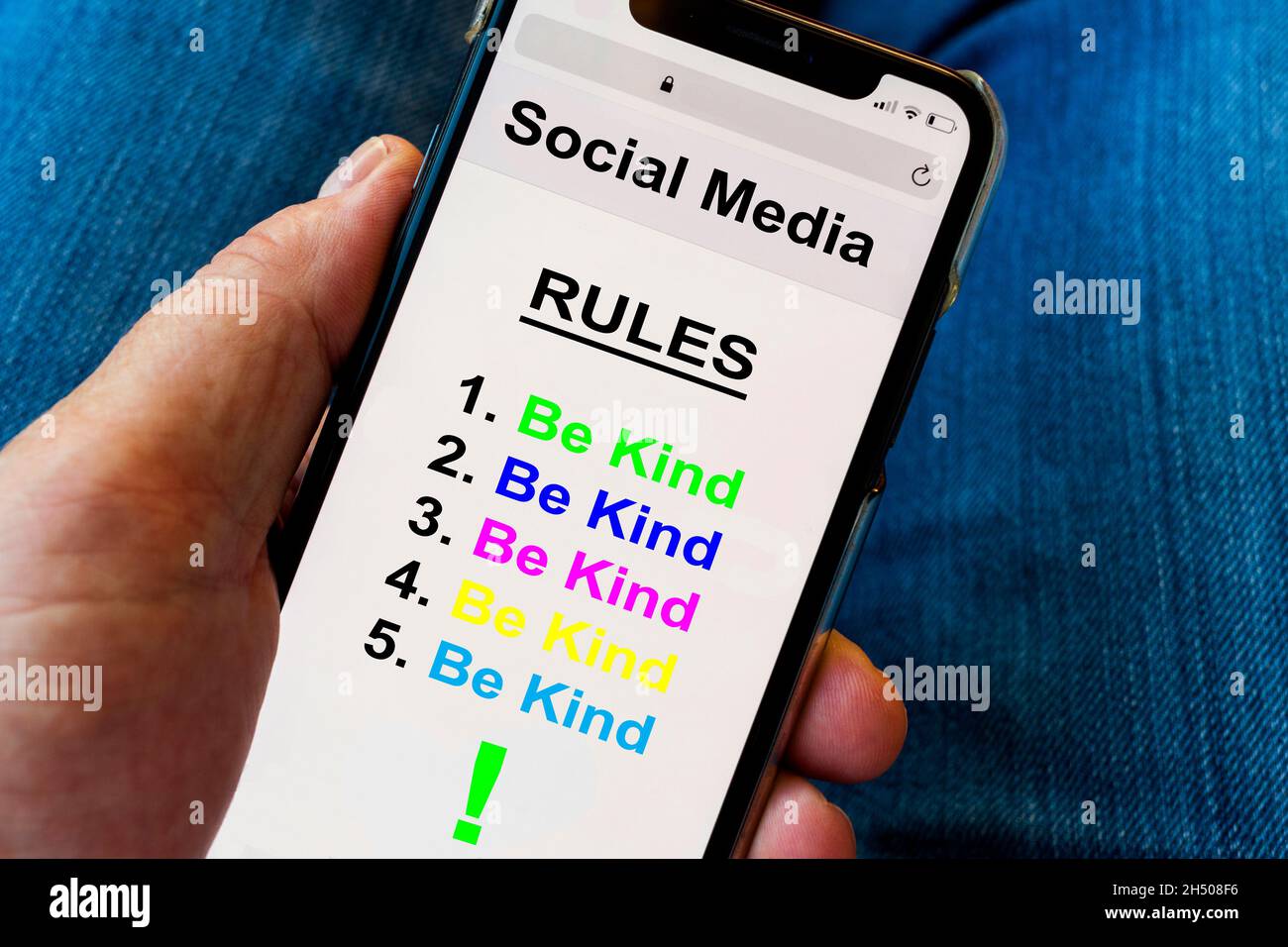 Social media rules viewed on a mobile phone (digitally altered) Stock Photo