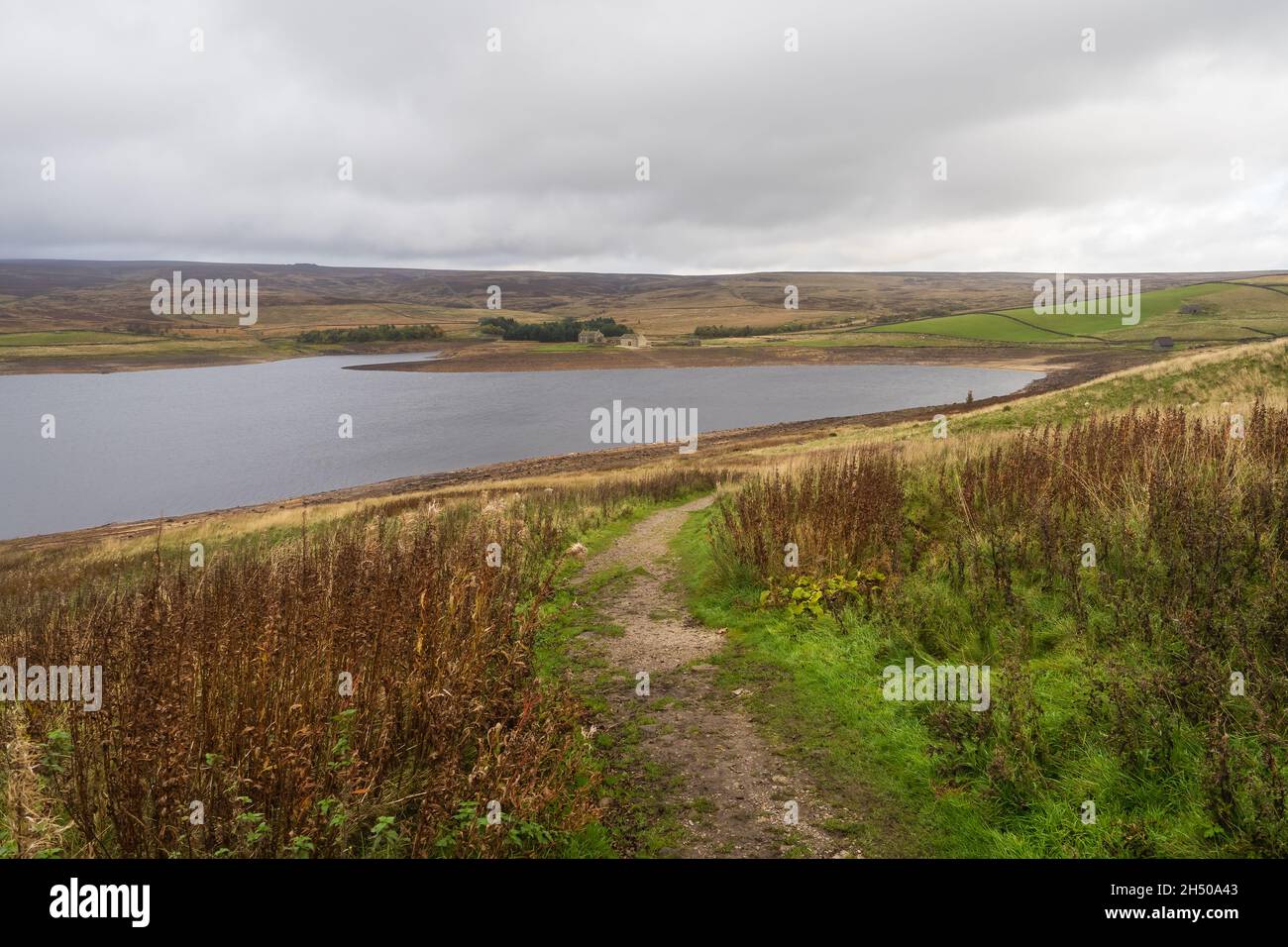 Grimwith Reservoir is located in the Yorkshire Dales in North Yorkshire, England. It was originally built by the Bradford Corporation as one of eleven Stock Photo
