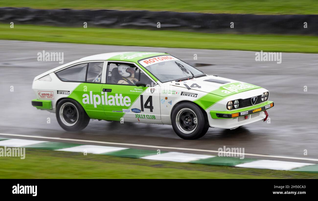 1982 Alfa Romeo GTV6 with driver Paul Clayson during the Gerry Marshall Trophy heats at the Goodwood 78th Members Meeting, Sussex, UK. Stock Photo