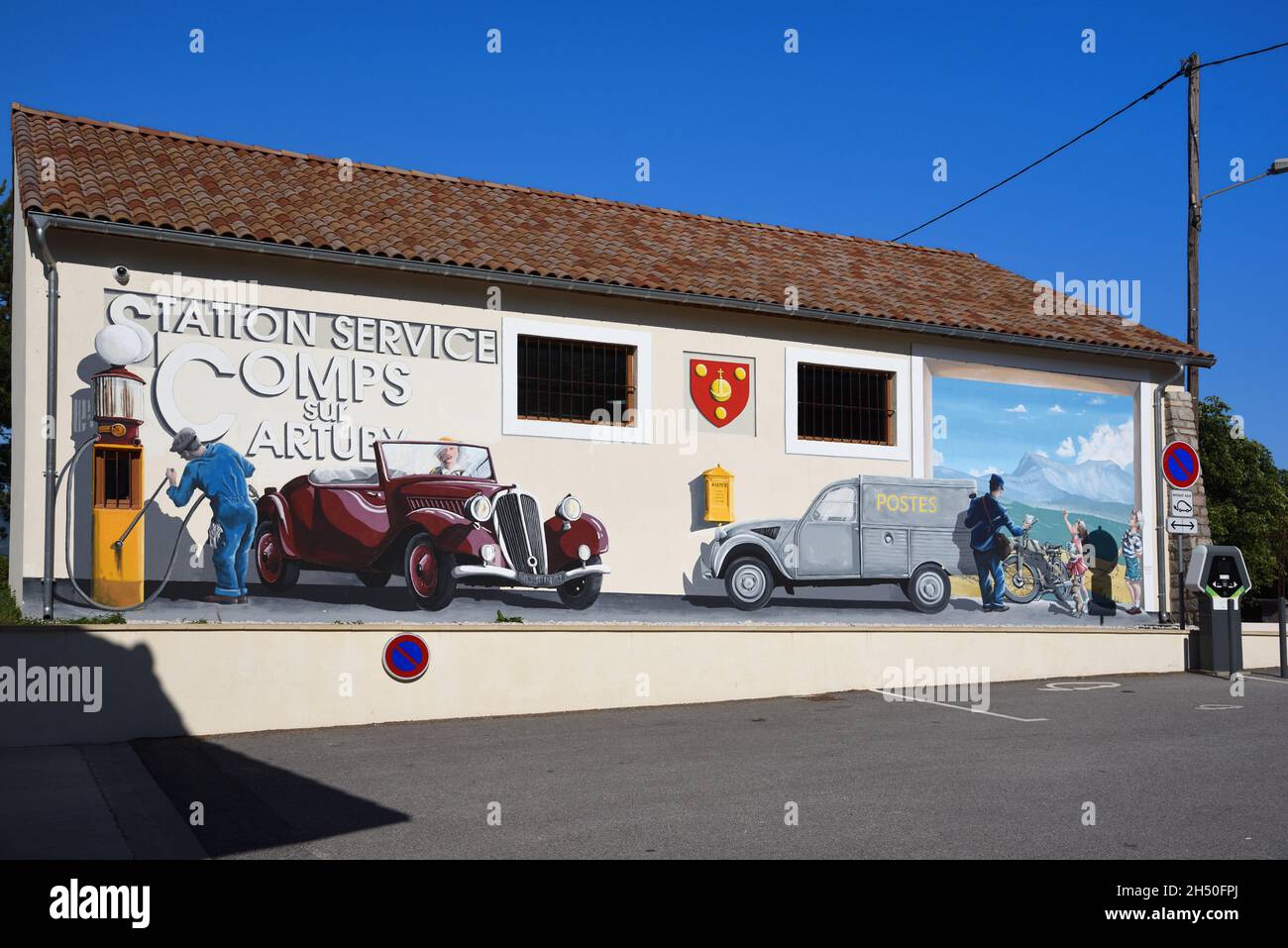 Petrol Station, Filling Station or Gas Station with Decorative Murals or Wall Paintings of Vintage French Cars Comps-sur-Artuby Var Provence France Stock Photo