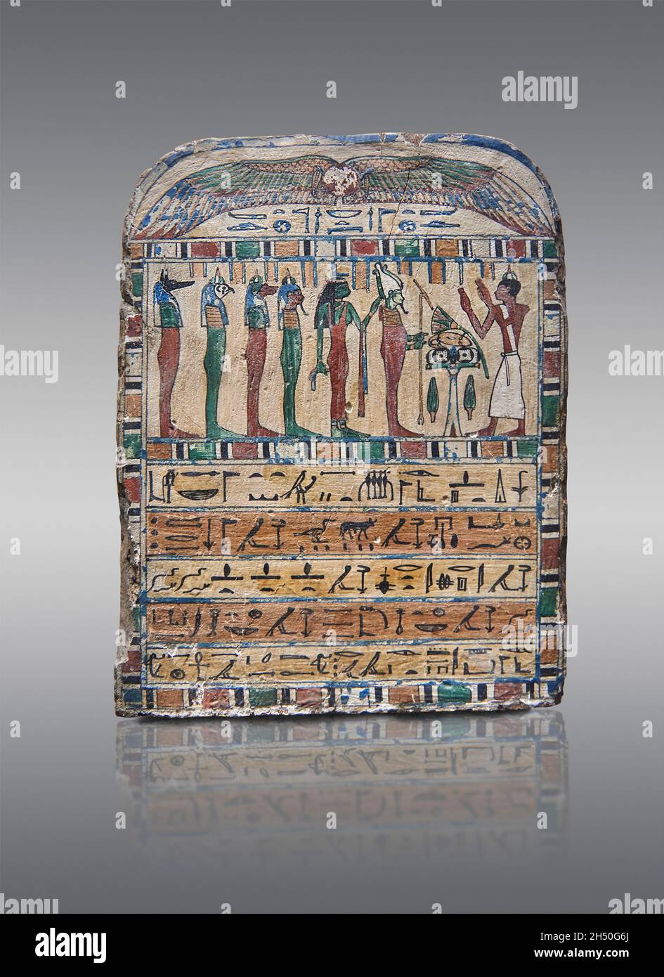 Ancient Egyptian stele of Irethorrou, 780-656 BC, 25th Dynasty, painted wood. The Louvre Museum inv N3387. Adoration scene; man standing wearing Kilt, Stock Photo