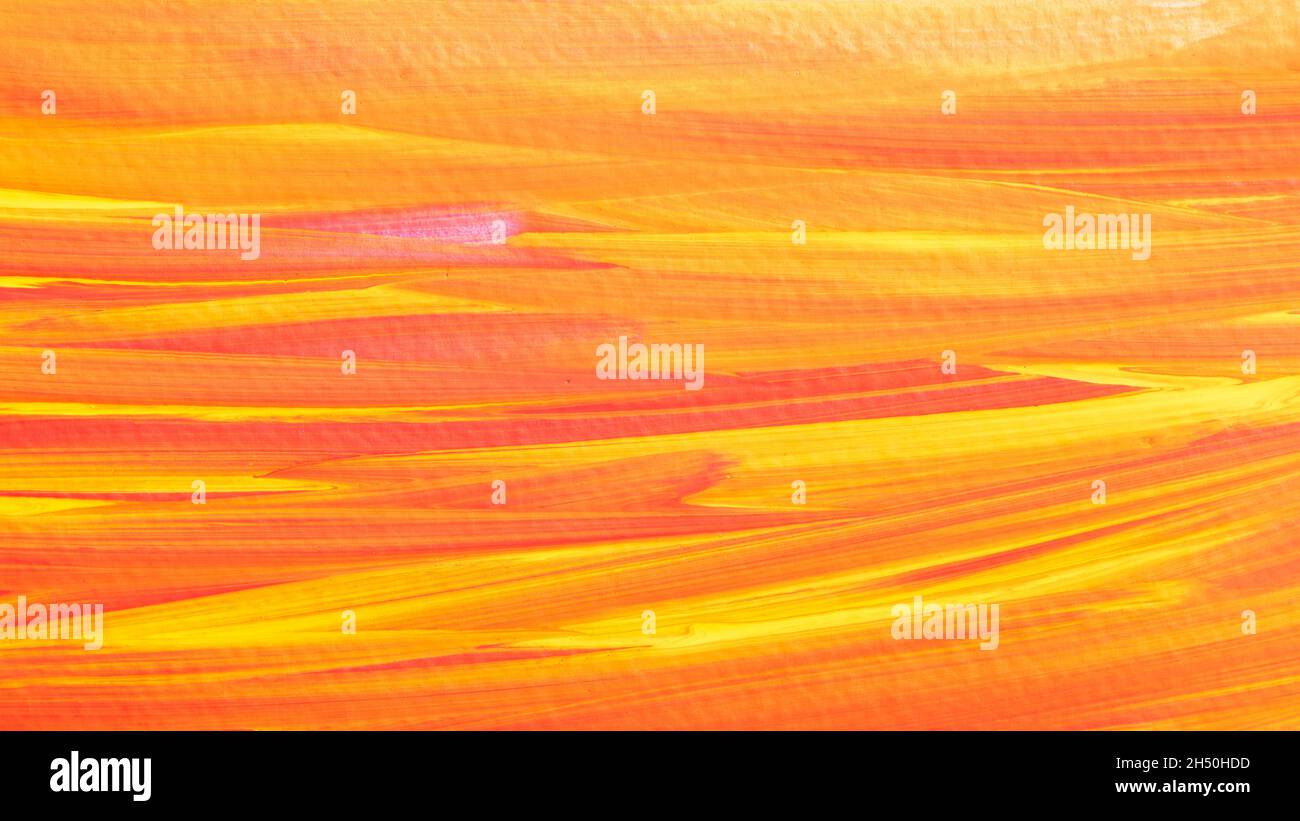 Yellow orange paint brush strokes abstract background Stock Photo