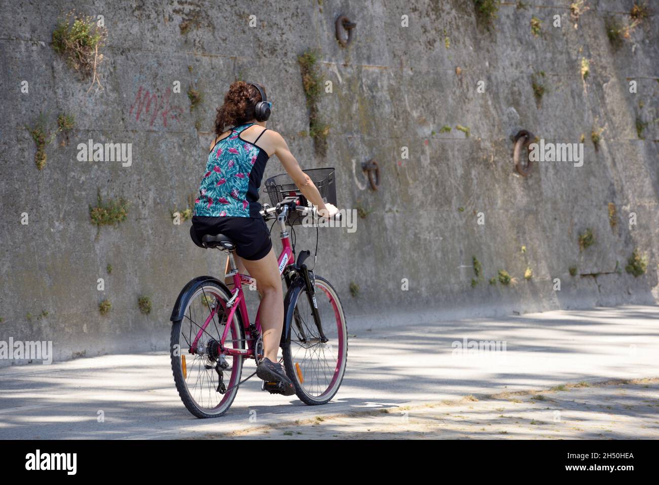 cycling along the tiber river, rome, italy Stock Photo