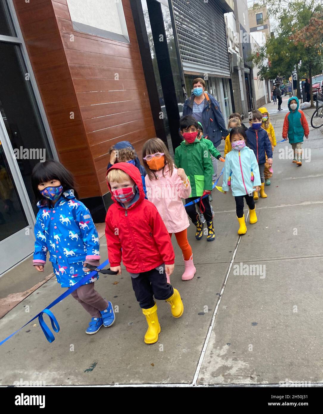 Kindergarten children on a walk through the neighborhood. Windsor Terrace, Brooklyn, New York. Stock Photo