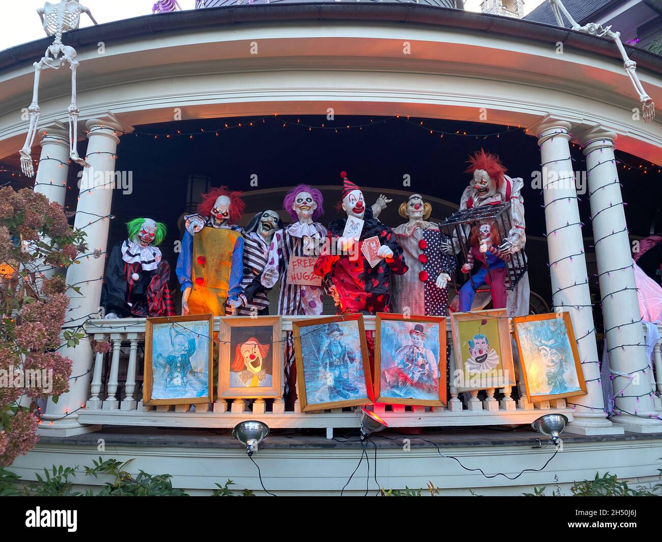 Scary Halloween clowns, part of an installation on the porch of a large