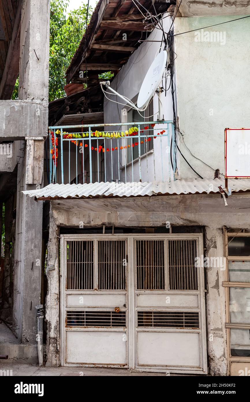 Slum Window Old house with one window. Turkish small business closed. Slum in ...