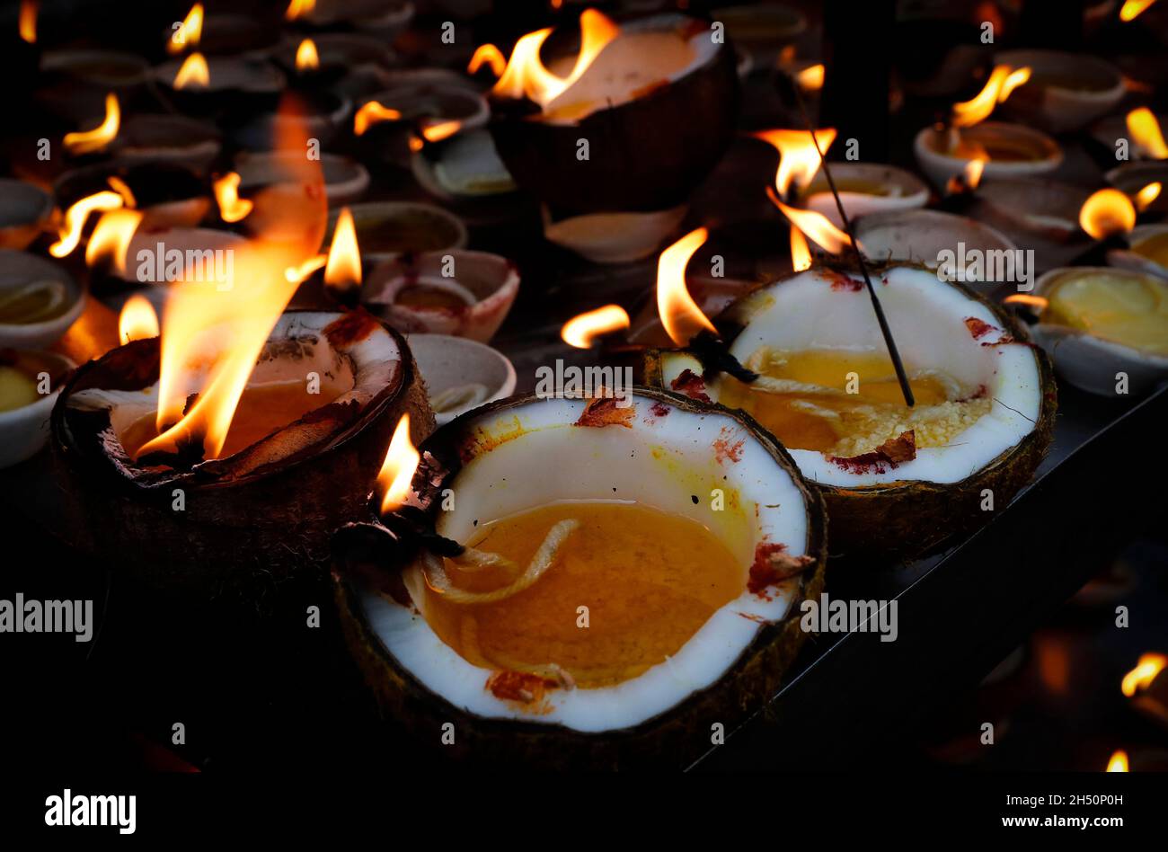 Kuala Lumpur, Malaysia. 04th Nov, 2021. Lit coconut oil lamps are seen at  the Batu Caves temple during the festival.Diwali is one of the major  religious festivals in Hinduism. The Goddess Lakshmi,