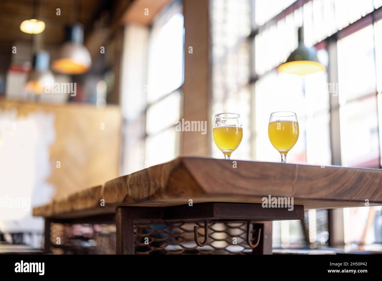 Wooden table with alcohol cocktails at cafe Stock Photo Alamy
