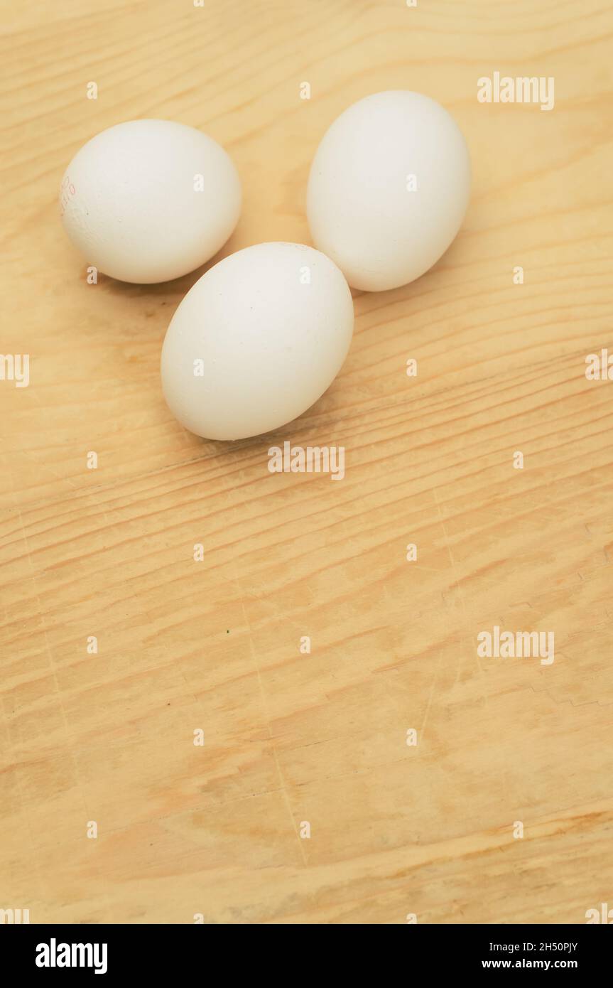 organic white eggs on a rustic wooden background with text space Stock ...