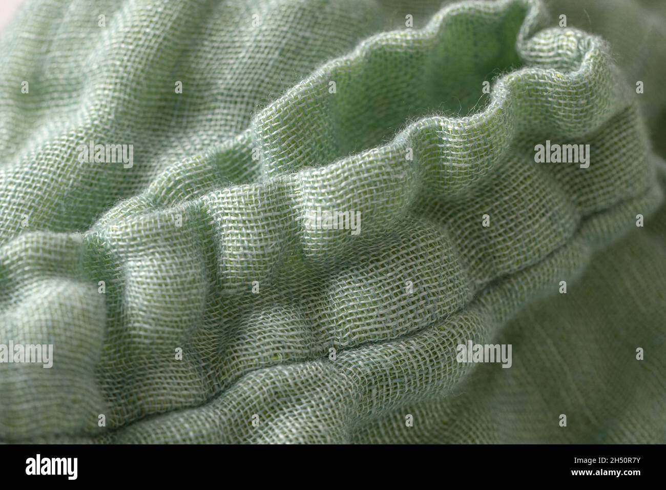 Linen fabric texture macro close up in mint shades Stock Photo